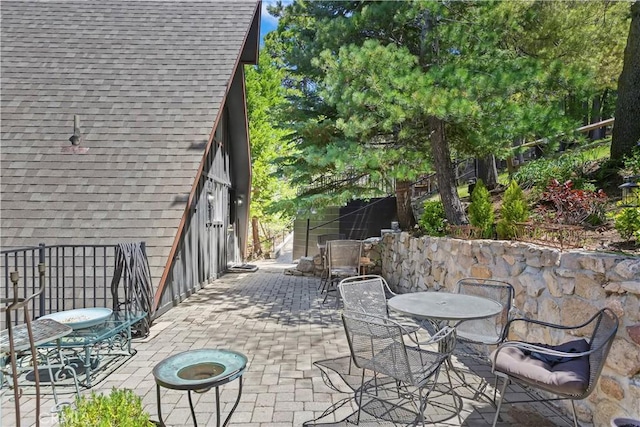 323 Mittry Ln, Lake Arrowhead, CA 92352 - view of patio / terrace featuring outdoor dining space and fence