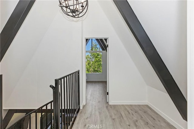 323 Mittry Ln, Lake Arrowhead, CA 92352 - additional living space featuring wood finished floors, vaulted ceiling, a chandelier, and baseboards
