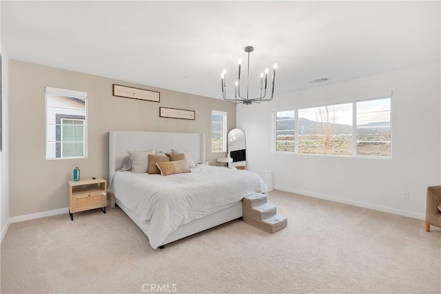 16708 Yarrow Ln, Fontana, CA 92336 - bedroom featuring a chandelier, baseboards, light colored carpet, and multiple windows