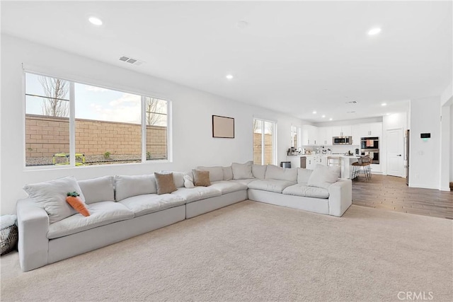 16708 Yarrow Ln, Fontana, CA 92336 - carpeted living room with recessed lighting
