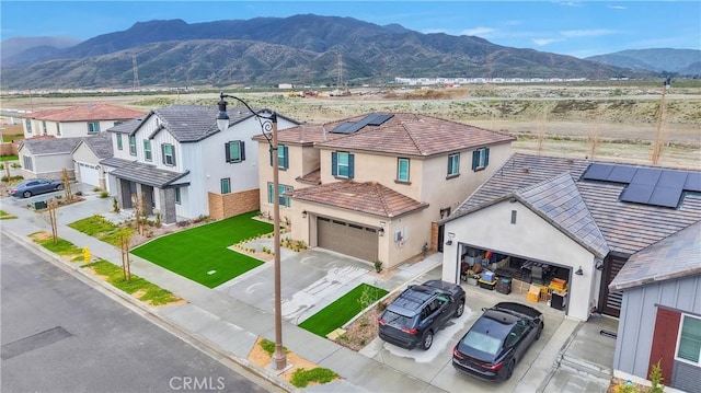 16708 Yarrow Ln, Fontana, CA 92336 - aerial view of residential area with mountains