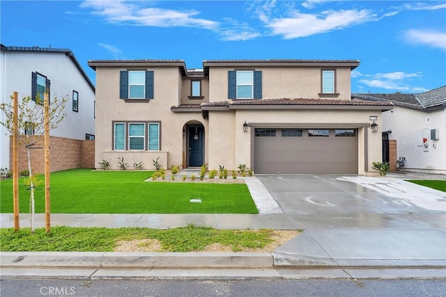 16708 Yarrow Ln, Fontana, CA 92336 - view of front facade with driveway, stucco siding, a garage, and a tile roof