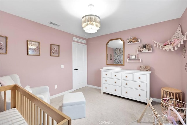 16708 Yarrow Ln, Fontana, CA 92336 - bedroom with light colored carpet, a chandelier, baseboards, and a nursery area