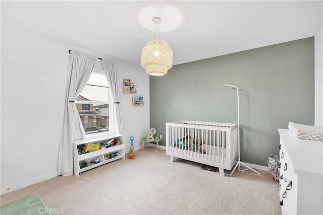 16708 Yarrow Ln, Fontana, CA 92336 - carpeted bedroom with baseboards and a nursery area