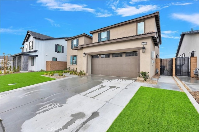16708 Yarrow Ln, Fontana, CA 92336 - view of front facade featuring concrete driveway, a garage, stucco siding, and a gate
