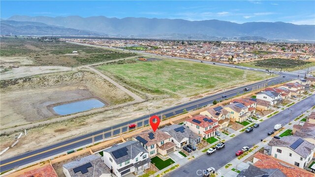 16708 Yarrow Ln, Fontana, CA 92336 - aerial view of residential area featuring mountains