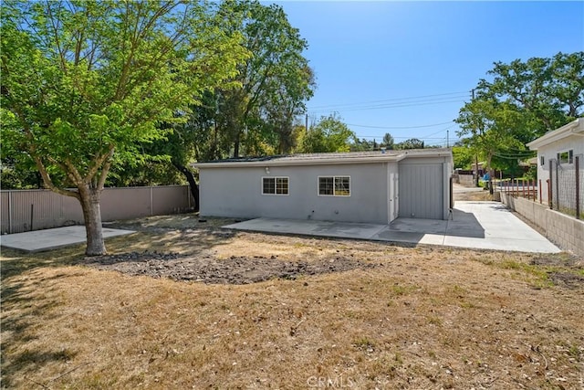 8975 Curbaril Ave, Atascadero, CA 93422 - back of house featuring a patio area, a fenced backyard, and stucco siding