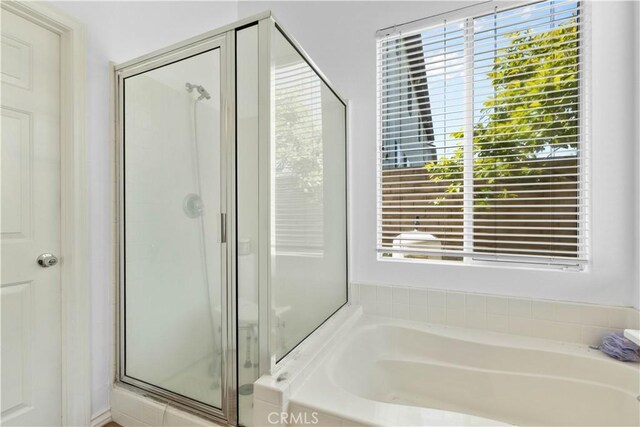 11556 Caldy Ave, Loma Linda, CA 92354 - full bath with a stall shower and a garden tub