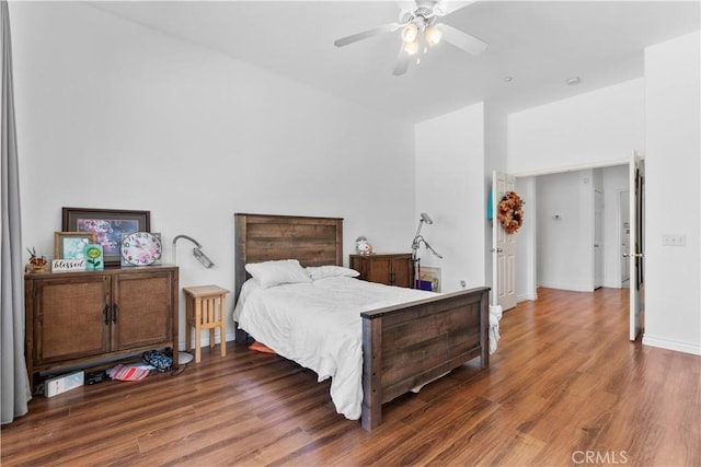 11556 Caldy Ave, Loma Linda, CA 92354 - bedroom with wood finished floors, baseboards, a ceiling fan, and a high ceiling