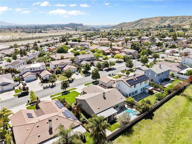 11556 Caldy Ave, Loma Linda, CA 92354 - aerial perspective of suburban area featuring a mountainous background and a pool