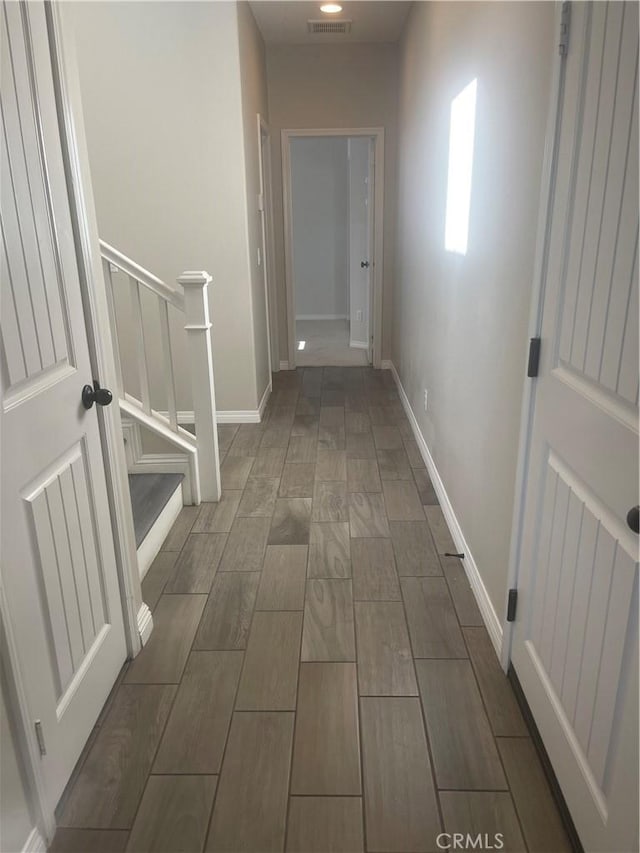 320 E Costera Ct, Placentia, CA 92870 - corridor featuring wood finish floors, baseboards, and stairway