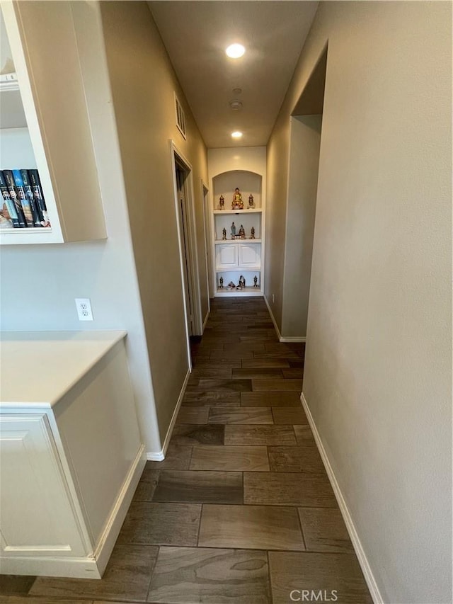 320 E Costera Ct, Placentia, CA 92870 - hallway featuring built in features, baseboards, wood finished floors, and recessed lighting