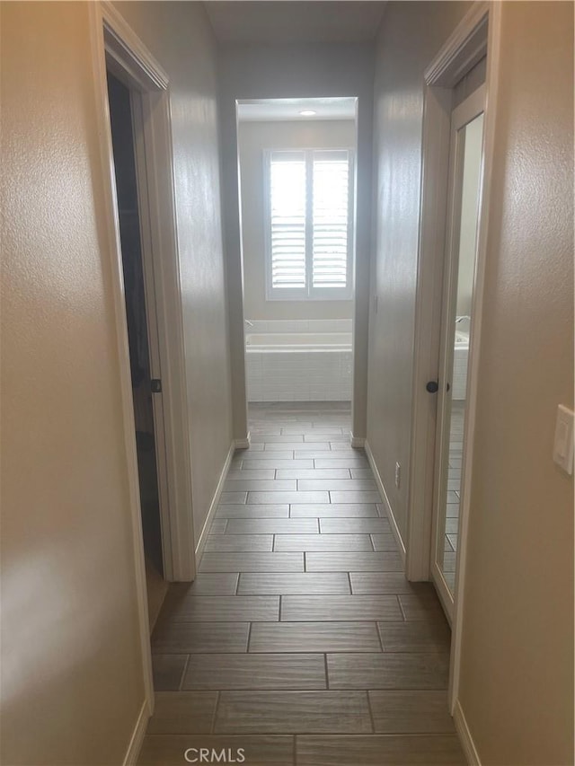 320 E Costera Ct, Placentia, CA 92870 - hall with wood tiled floors and baseboards