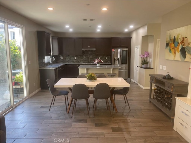 320 E Costera Ct, Placentia, CA 92870 - dining area with wood tiled floors, recessed lighting, and baseboards