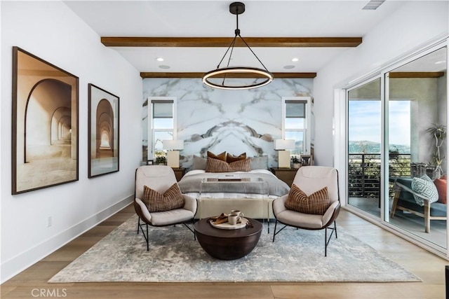 bedroom with access to exterior, beam ceiling, wood finished floors, baseboards, and recessed lighting
