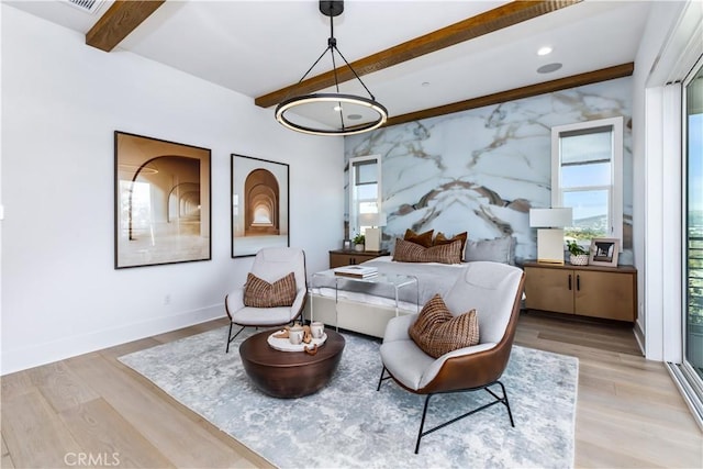 bedroom featuring beam ceiling, multiple windows, light wood finished floors, baseboards, and recessed lighting