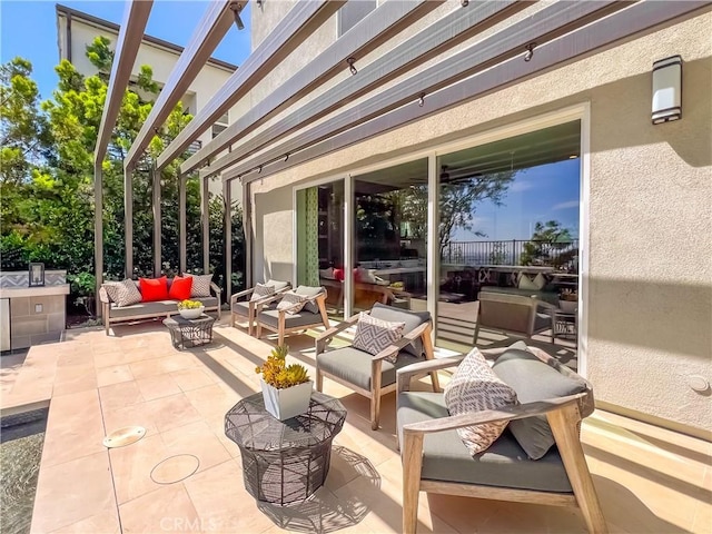 view of patio / terrace featuring an outdoor hangout area and a pergola