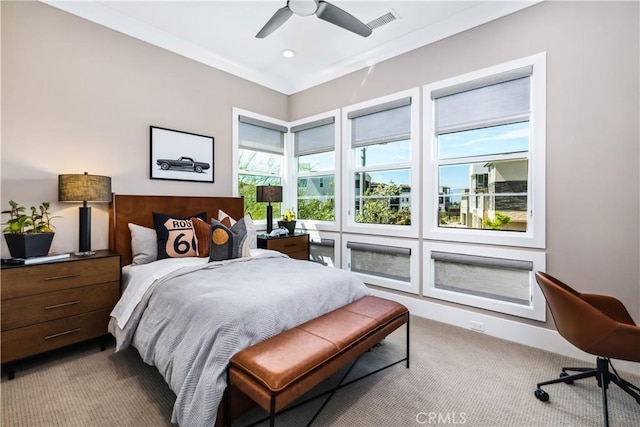 carpeted bedroom with ceiling fan