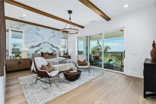 bedroom with access to outside, beam ceiling, wood finished floors, baseboards, and recessed lighting
