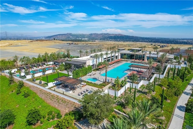 community pool featuring a mountain view
