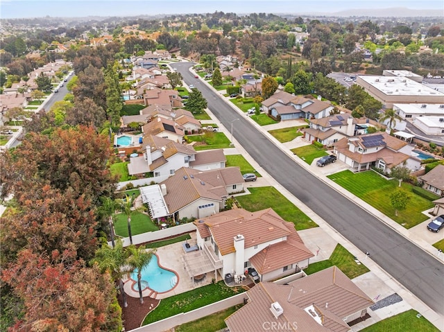 aerial perspective of suburban area with a pool area