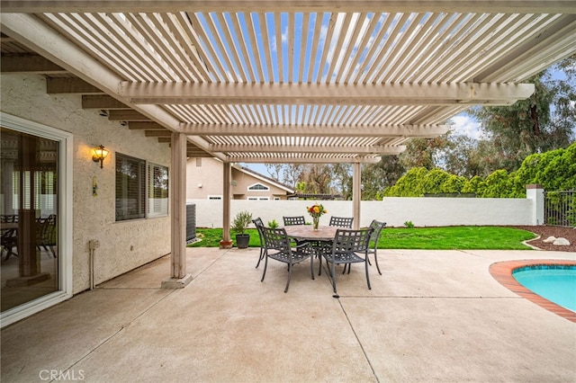 view of patio featuring a fenced backyard, outdoor dining space, and a pergola
