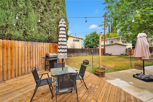 6154 Goldenrod Ln, Riverside, CA 92504 - wooden deck featuring a grill and outdoor dining space