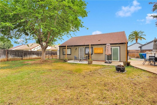 6154 Goldenrod Ln, Riverside, CA 92504 - rear view of property with an outdoor fire pit, a tile roof, and a patio area