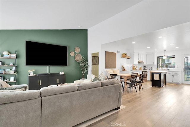 6154 Goldenrod Ln, Riverside, CA 92504 - living area featuring light wood-style flooring and recessed lighting