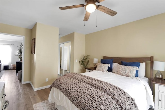 6154 Goldenrod Ln, Riverside, CA 92504 - bedroom featuring light wood-style floors, baseboards, and ceiling fan