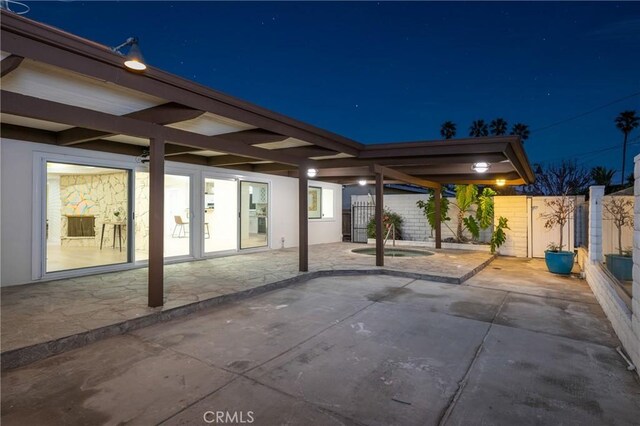 1741 Perch St, San Pedro, CA 90732 - patio at twilight featuring fence and an in-ground hot tub