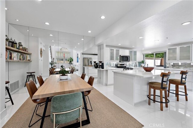 1225 Via Presa, San Clemente, CA 92672 - dining room with recessed lighting and light tile patterned floors