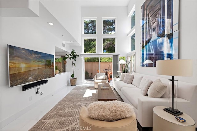 1225 Via Presa, San Clemente, CA 92672 - living area featuring a towering ceiling, recessed lighting, and healthy amount of natural light