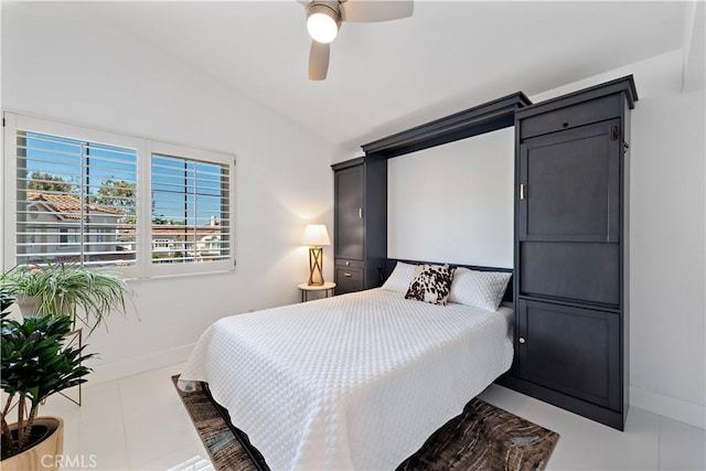 1225 Via Presa, San Clemente, CA 92672 - tiled bedroom featuring vaulted ceiling, baseboards, and a ceiling fan