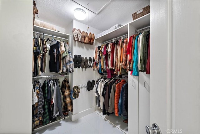 1225 Via Presa, San Clemente, CA 92672 - walk in closet with tile patterned flooring and attic access