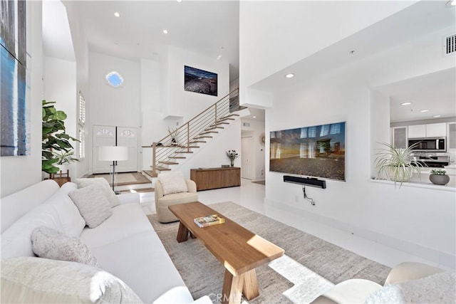 1225 Via Presa, San Clemente, CA 92672 - living room with a towering ceiling, stairway, and recessed lighting