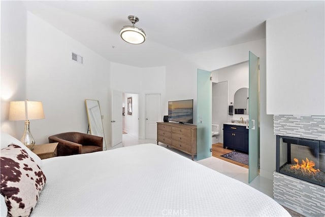 1225 Via Presa, San Clemente, CA 92672 - bedroom with ensuite bathroom and a fireplace