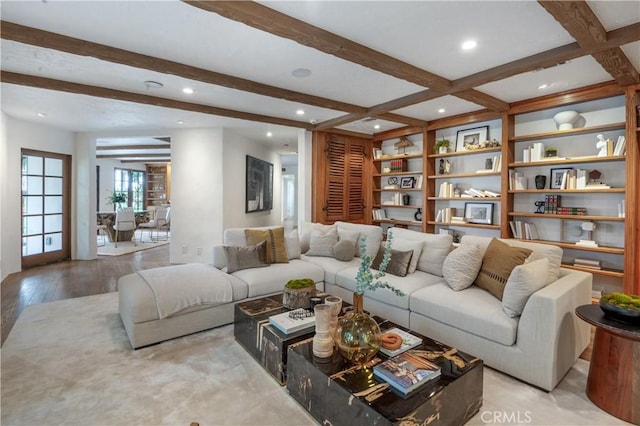 living room with beam ceiling and recessed lighting