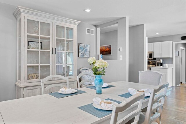 3883 Mount Everest Blvd, San Diego, CA 92111 - dining space featuring light wood-style floors and recessed lighting