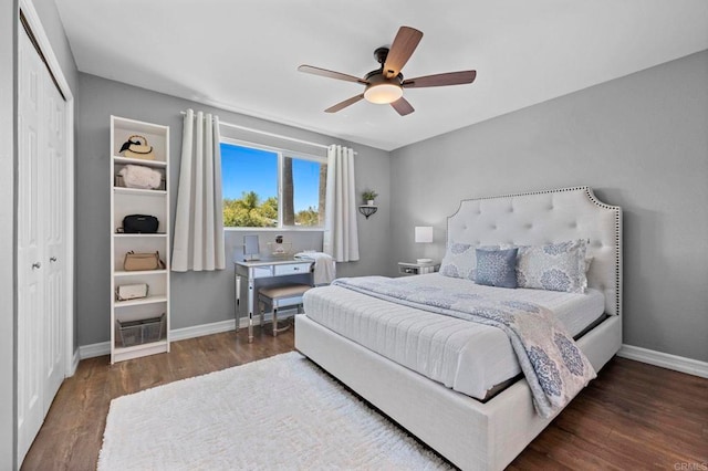 3883 Mount Everest Blvd, San Diego, CA 92111 - bedroom with wood finished floors, a closet, baseboards, and ceiling fan
