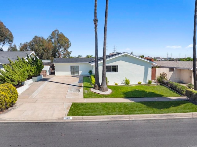 3883 Mount Everest Blvd, San Diego, CA 92111 - mid-century modern home featuring driveway, stucco siding, and a front lawn