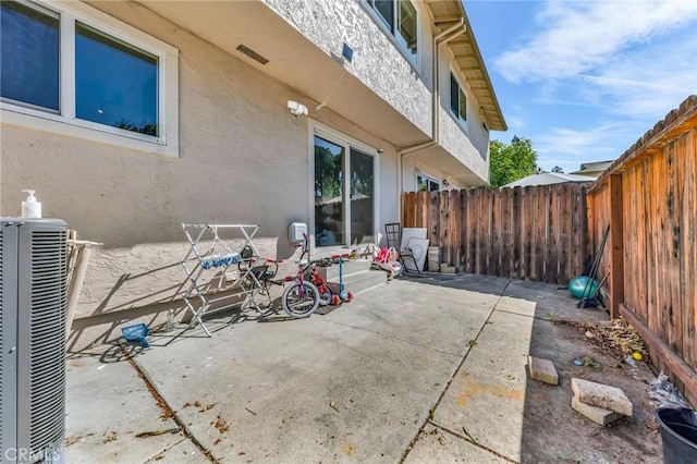 3862 Pimlico Dr, Pleasanton, CA 94588 - view of patio with central AC and a fenced backyard