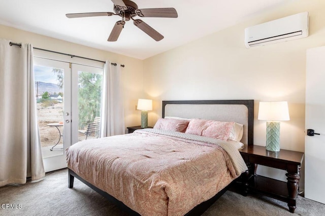 bedroom featuring a wall unit AC, carpet, access to exterior, and ceiling fan