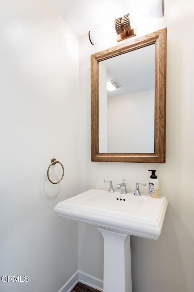 bathroom featuring baseboards