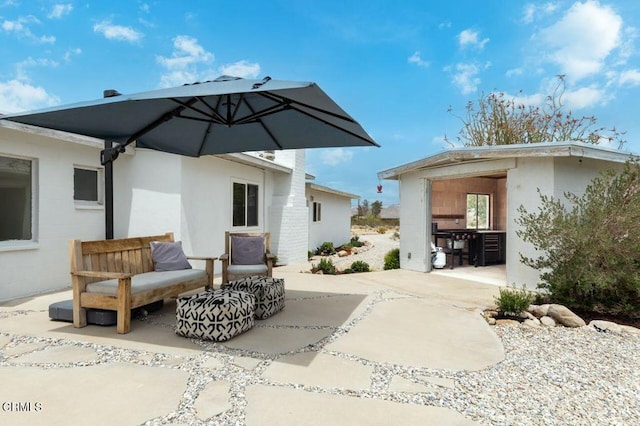rear view of property with a patio