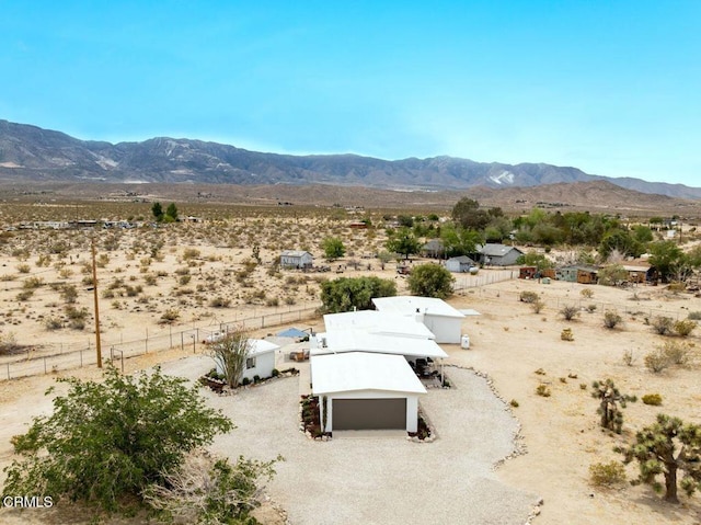 view of mountain background with a desert landscape and rural landscape