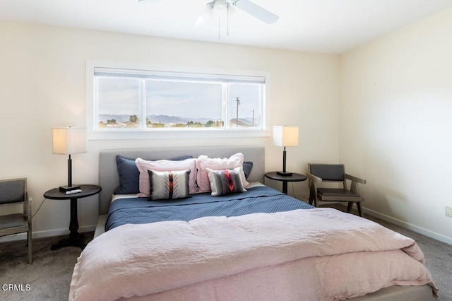 bedroom featuring carpet floors, baseboards, and ceiling fan