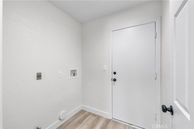 1032 Glenn Ct, Lancaster, CA 93535 - washroom featuring light wood-type flooring, washer hookup, hookup for a gas dryer, baseboards, and electric dryer hookup