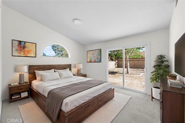 1032 Glenn Ct, Lancaster, CA 93535 - bedroom featuring light colored carpet, access to exterior, multiple windows, and vaulted ceiling