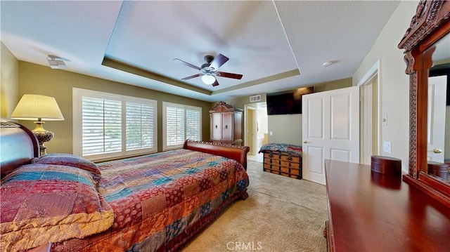 29456 Green Side Ct, Murrieta, CA 92563 - carpeted bedroom with a raised ceiling and a ceiling fan
